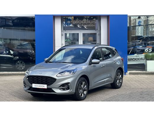 Ford Kuga 2.5 PHEV 225PK ST-Line Gratis trekhaak! | Standverwarming | Camera achter | Climate Control | Cru... Ford Kuga 2.5 PHEV 225PK ST-Line Gratis trekhaak! | Standverwarming | Camera achter | Climate Control | Cru...