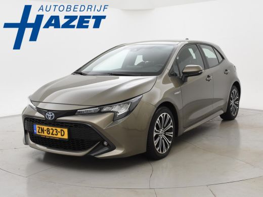 Toyota Corolla 1.8 HYBRID FIRST EDITION *BTW* + ADAPTIVE CRUISE / 17 INCH / LED / NAVIGATIE Toyota Corolla 1.8 HYBRID FIRST EDITION *BTW* + ADAPTIVE CRUISE / 17 INCH / LED / NAVIGATIE