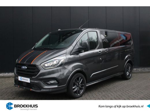 Ford Transit Custom 320 2.0 TDCI L2H1 185pk Sport Automaat | Trekhaak | Bi-xenon | BLIS | 2x schuifdeur | Adaptieve c... Ford Transit Custom 320 2.0 TDCI L2H1 185pk Sport Automaat | Trekhaak | Bi-xenon | BLIS | 2x schuifdeur | Adaptieve c...