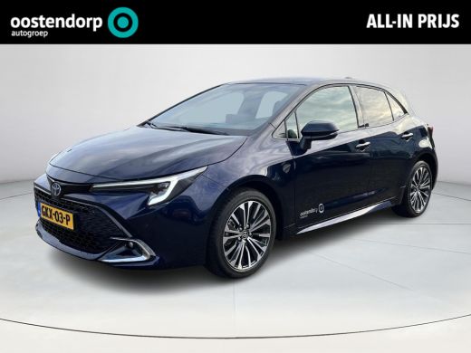 Toyota Corolla Hybrid 140 Dynamic | Demonstratie auto | Midnight blue metallic / zwart dak