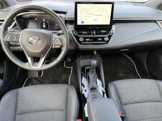 Toyota Corolla Hybrid 140 Dynamic | Demonstratie auto | Midnight blue metallic / zwart dak ActivLease financial lease