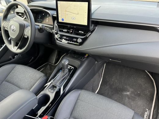 Toyota Corolla Hybrid 140 Dynamic | Demonstratie auto | Midnight blue metallic / zwart dak ActivLease financial lease