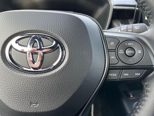 Toyota Corolla Hybrid 140 Dynamic | Demonstratie auto | Midnight blue metallic / zwart dak ActivLease financial lease