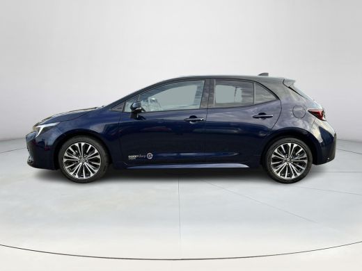 Toyota Corolla Hybrid 140 Dynamic | Demonstratie auto | Midnight blue metallic / zwart dak ActivLease financial lease