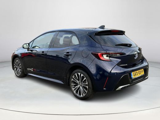 Toyota Corolla Hybrid 140 Dynamic | Demonstratie auto | Midnight blue metallic / zwart dak ActivLease financial lease
