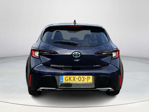Toyota Corolla Hybrid 140 Dynamic | Demonstratie auto | Midnight blue metallic / zwart dak ActivLease financial lease