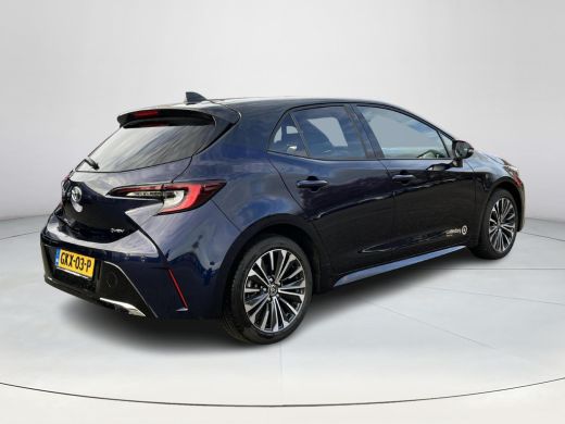 Toyota Corolla Hybrid 140 Dynamic | Demonstratie auto | Midnight blue metallic / zwart dak ActivLease financial lease