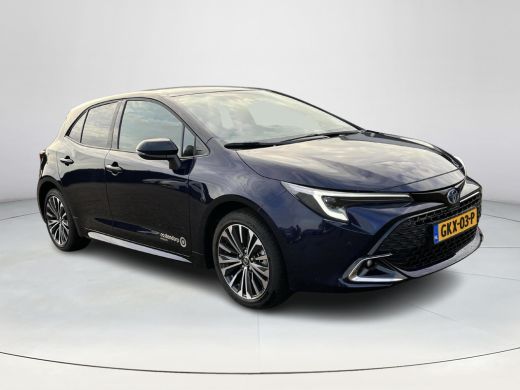 Toyota Corolla Hybrid 140 Dynamic | Demonstratie auto | Midnight blue metallic / zwart dak ActivLease financial lease