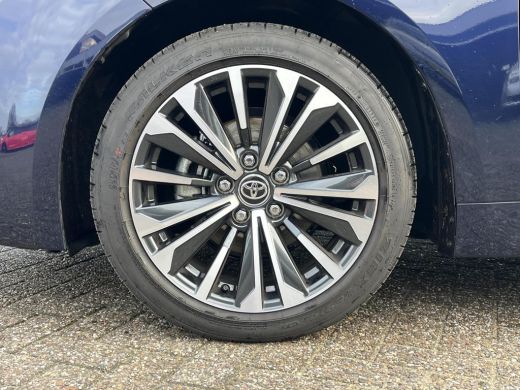 Toyota Corolla Hybrid 140 Dynamic | Demonstratie auto | Midnight blue metallic / zwart dak ActivLease financial lease
