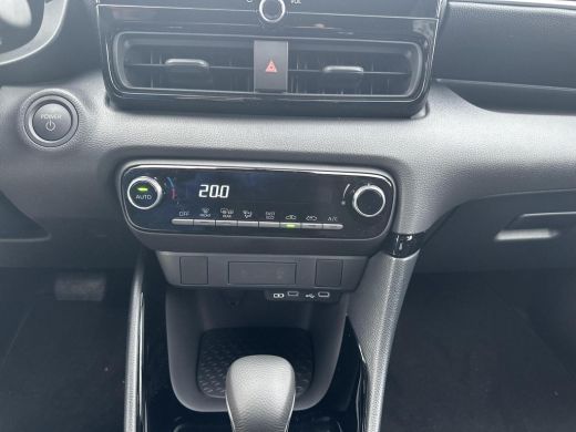 Toyota Yaris 1.5 Hybrid 115 First Edition | Platinum Pearl White | Demonstratie auto ActivLease financial lease