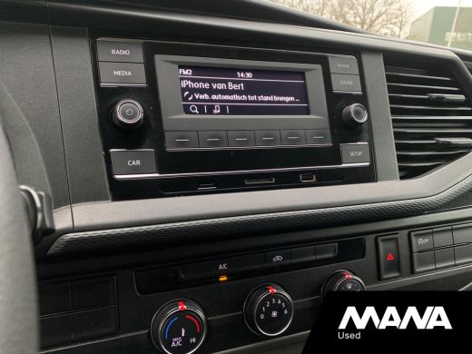 Volkswagen Transporter 2.0 TDI L1H1 Airco Bluetooth Trekhaak Bijrijdersbank Cruise LaadruimteBekleding 12V Airbag ActivLease financial lease