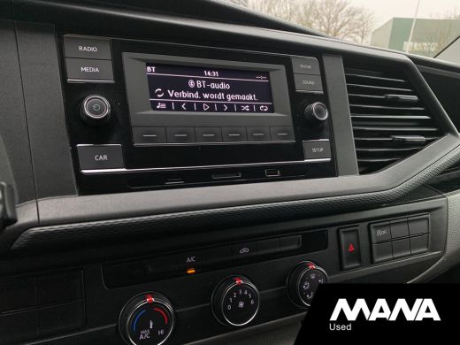 Volkswagen Transporter 2.0 TDI L1H1 Airco Bluetooth Trekhaak Bijrijdersbank Cruise LaadruimteBekleding 12V Airbag ActivLease financial lease