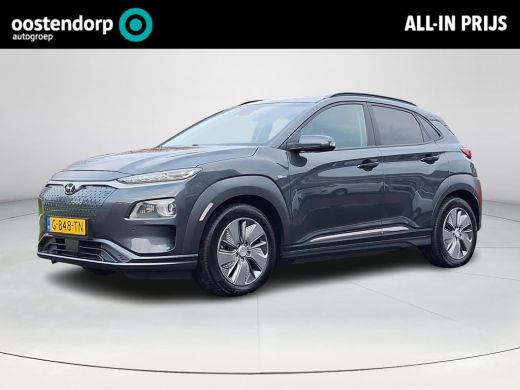 Hyundai KONA EV Premium 64 kWh | Achteruitrijcamera | Parkeersensoren | Stoelverwarming/verkoeling | Head-up d... Hyundai KONA EV Premium 64 kWh | Achteruitrijcamera | Parkeersensoren | Stoelverwarming/verkoeling | Head-up d...