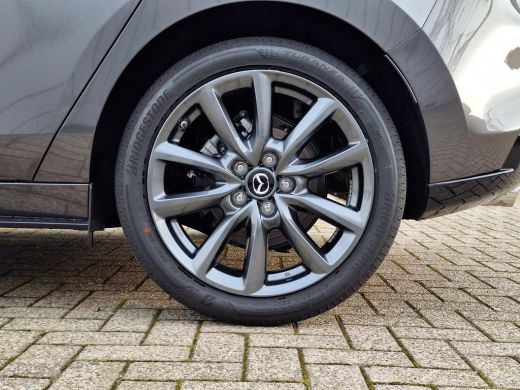Mazda 3 2.5 e-SkyActiv-G M Hybrid 140 Takumi | Leder | Bose | Stoel/stuurverwarming | Adaptief cruise con... ActivLease financial lease