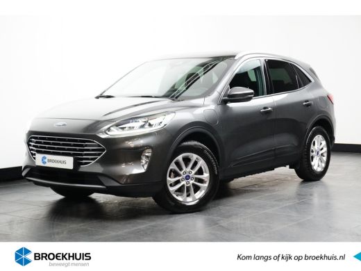 Ford Kuga 2.5 PHEV Titanium | Wegklap Trekhaak | Pano-Dak | Elektr. Achterklep | Camera | Winter-Pack | Stu... Ford Kuga 2.5 PHEV Titanium | Wegklap Trekhaak | Pano-Dak | Elektr. Achterklep | Camera | Winter-Pack | Stu...