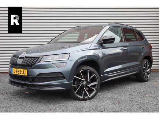 Skoda Karoq 1.5 TSI Sportline Business Digital Dash / Canton / 19inch / Trekhaak / Stoelverwarming / Skoda Karoq 1.5 TSI Sportline Business Digital Dash / Canton / 19inch / Trekhaak / Stoelverwarming /