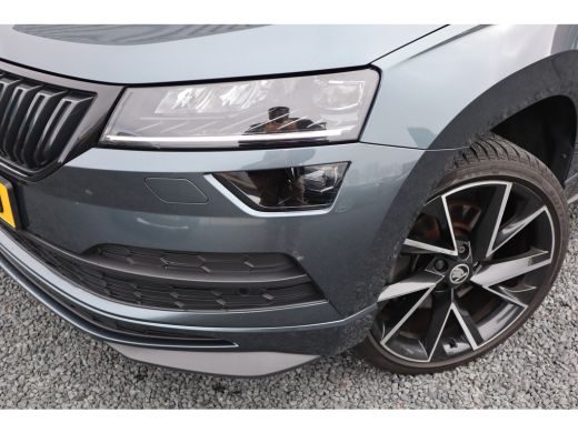 Skoda Karoq 1.5 TSI Sportline Business Digital Dash / Canton / 19inch / Trekhaak / Stoelverwarming / ActivLease financial lease
