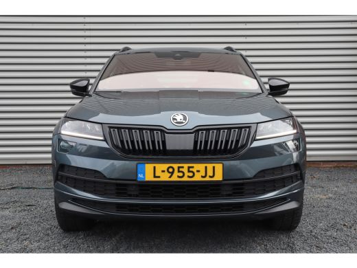 Skoda Karoq 1.5 TSI Sportline Business Digital Dash / Canton / 19inch / Trekhaak / Stoelverwarming / ActivLease financial lease