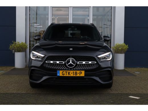 Mercedes GLA 180 AMG Line | Camera | Stoelverwarming | Cruise Control | Elektr. klep | PDC V/A | Navi ActivLease financial lease