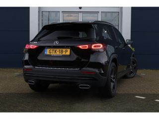 Mercedes GLA 180 AMG Line | Camera | Stoelverwarming | Cruise Control | Elektr. klep | PDC V/A | Navi