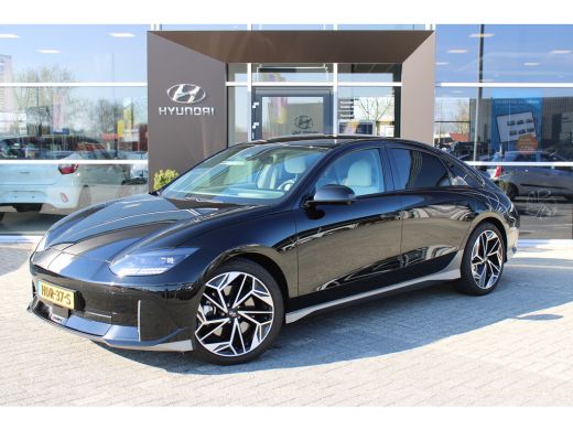 Hyundai IONIQ 6 Lounge AWD 77 kWh | 1500KG trekgewicht | V2L | Elektrische stoelverstelling met geheugenfunctie |... Hyundai IONIQ 6 Lounge AWD 77 kWh | 1500KG trekgewicht | V2L | Elektrische stoelverstelling met geheugenfunctie |...