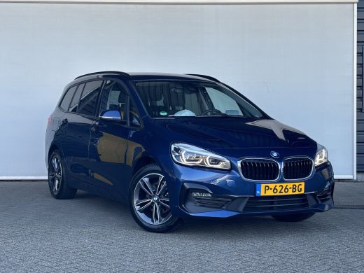 BMW 2 Serie Gran Tourer 216i 7p. Business Edition | trekhaak || Cruise control | Elektrisch bedienbare koffer... ActivLease financial lease