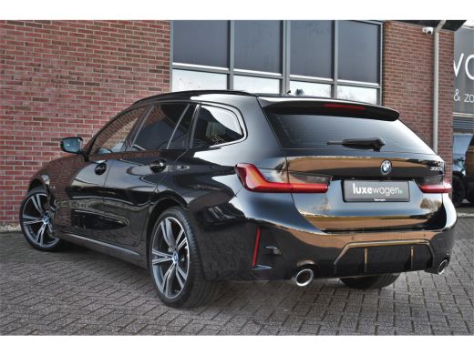BMW 3 Serie Touring 330e M-Sport el-trekh el-zetels HUD 19inch camera HiFi ActivLease financial lease
