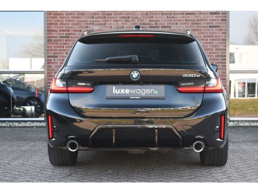 BMW 3 Serie Touring 330e M-Sport el-trekh el-zetels HUD 19inch camera HiFi ActivLease financial lease