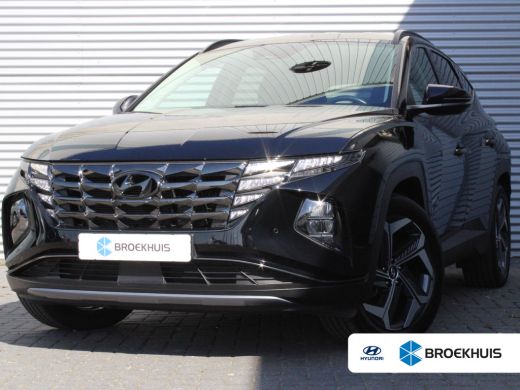 Hyundai Tucson 1.6 T-GDI PHEV Comfort Smart 4WD 265pk | Stuur/Stoelverwarming | Achteruitrijcamera | Cruise cont... Hyundai Tucson 1.6 T-GDI PHEV Comfort Smart 4WD 265pk | Stuur/Stoelverwarming | Achteruitrijcamera | Cruise cont...
