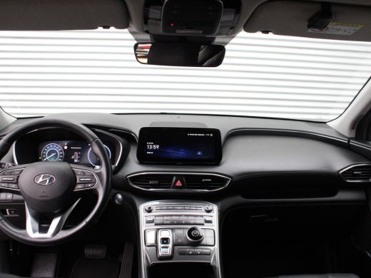Hyundai Santa Fe Hyundai 1.6 T-GDI HEV Comfort Smart 7p. | Cruise control adaptief met Stop&Go | Dodehoekdetectie ... ActivLease financial lease