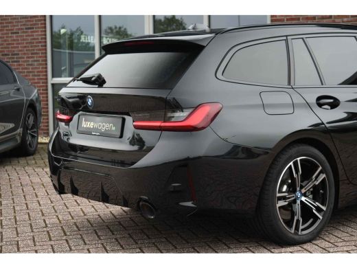 BMW 3 Serie Touring 320e M-Sport ACC HUD Sfeer Camera HiFi Stuurverw ActivLease financial lease