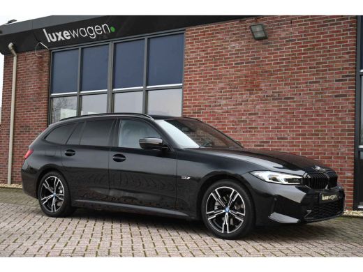 BMW 3 Serie Touring 320e M-Sport ACC HUD Sfeer Camera HiFi Stuurverw ActivLease financial lease