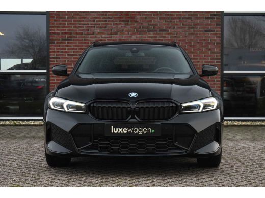BMW 3 Serie Touring 320e M-Sport ACC HUD Sfeer Camera HiFi Stuurverw ActivLease financial lease