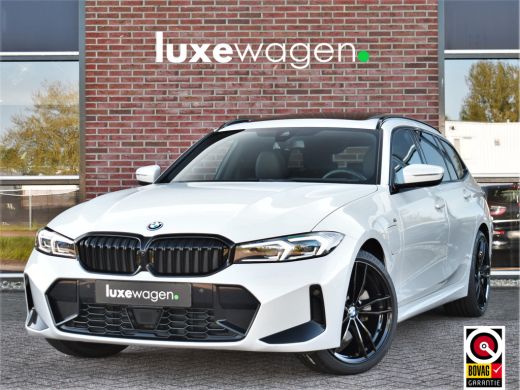 BMW 3 Serie Touring 330e M-Sport Pano ACC Trekh HUD El-zetel 19inch Adp-onderstel BMW 3 Serie Touring 330e M-Sport Pano ACC Trekh HUD El-zetel 19inch Adp-onderstel