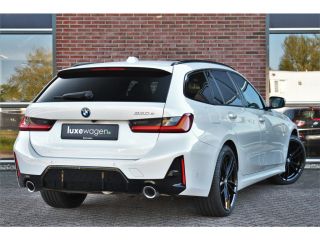 BMW 3 Serie Touring 330e M-Sport Pano ACC Trekh HUD El-zetel 19inch Adp-onderstel