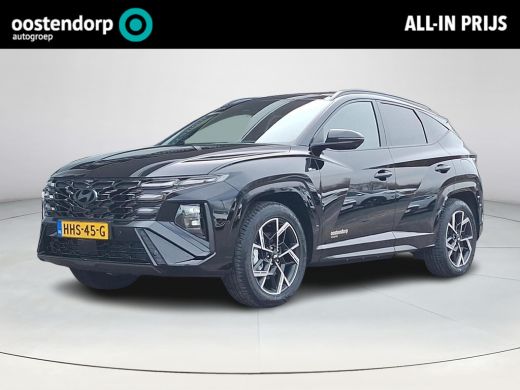 Hyundai Tucson 1.6 T-GDI PHEV N Line Sky | Afneembare Trekhaak | 360 graden camera | All-Season banden | Head-up... Hyundai Tucson 1.6 T-GDI PHEV N Line Sky | Afneembare Trekhaak | 360 graden camera | All-Season banden | Head-up...