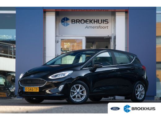 Ford Fiesta 1.0 EcoBoost Titanium | Apple Carplay/Android Auto | Cruise | Lichtmetalen velgen 15" | Lage km s... Ford Fiesta 1.0 EcoBoost Titanium | Apple Carplay/Android Auto | Cruise | Lichtmetalen velgen 15" | Lage km s...
