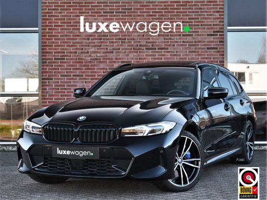 BMW 3 Serie Touring 330e M-Sport Pano Trekh ACC El-zetel HUD Carbon 19inch Adp-onderstel BMW 3 Serie Touring 330e M-Sport Pano Trekh ACC El-zetel HUD Carbon 19inch Adp-onderstel