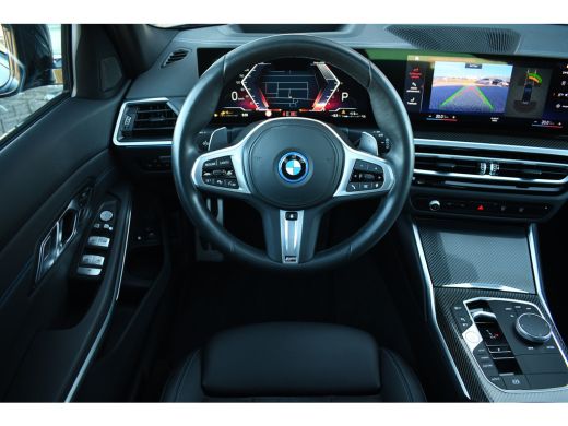 BMW 3 Serie Touring 330e M-Sport Pano Trekh ACC El-zetel HUD Carbon 19inch Adp-onderstel ActivLease financial lease
