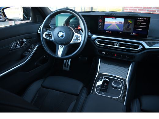 BMW 3 Serie Touring 330e M-Sport Pano Trekh ACC El-zetel HUD Carbon 19inch Adp-onderstel ActivLease financial lease