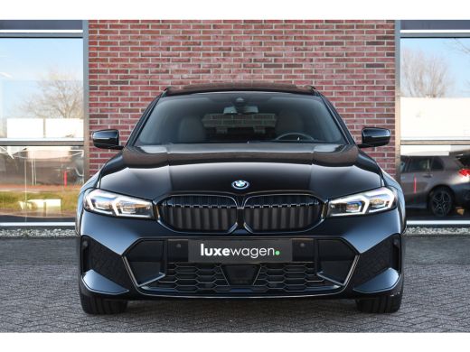 BMW 3 Serie Touring 330e M-Sport Pano Trekh ACC El-zetel HUD Carbon 19inch Adp-onderstel ActivLease financial lease