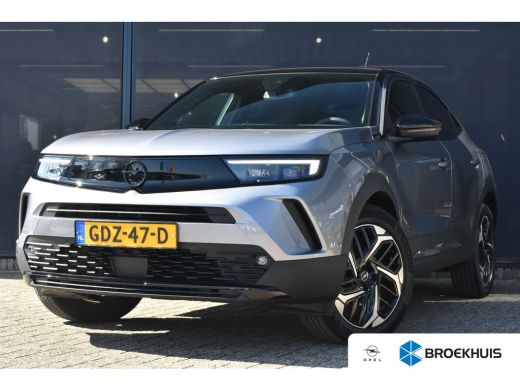 Opel Mokka Electric Long Range Ultimate 54 kWh 156pk | Navigatie | Alcantara | Stoel/Stuurverwarming | Achteruitrijca... Opel Mokka Electric Long Range Ultimate 54 kWh 156pk | Navigatie | Alcantara | Stoel/Stuurverwarming | Achteruitrijca...