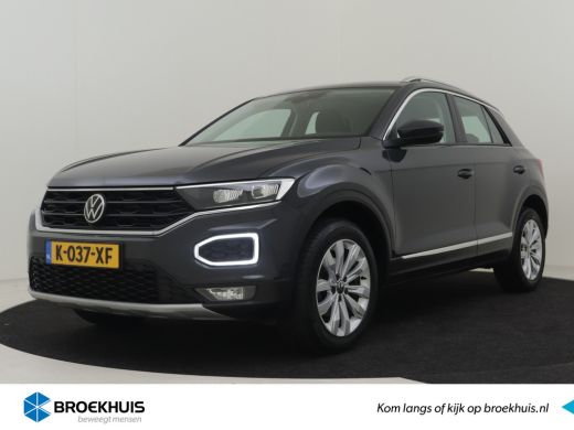 Volkswagen T-Roc 1.5 TSI DSG/AUTO Sport 150pk | 1e eigenaar | Adaptief cruise control | Navigatie | Parkeersensore... Volkswagen T-Roc 1.5 TSI DSG/AUTO Sport 150pk | 1e eigenaar | Adaptief cruise control | Navigatie | Parkeersensore...