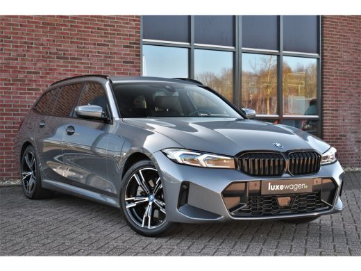 BMW 3 Serie Touring 320e M-Sport ACC HUD Sfeer Camera HiFi Stuurverw ActivLease financial lease