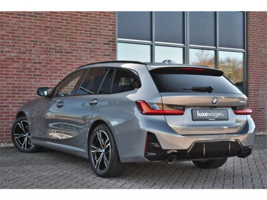 BMW 3 Serie Touring 320e M-Sport ACC HUD Sfeer Camera HiFi Stuurverw ActivLease financial lease