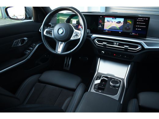 BMW 3 Serie Touring 320e M-Sport ACC HUD Sfeer Camera HiFi Stuurverw ActivLease financial lease