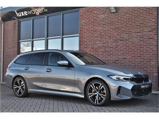 BMW 3 Serie Touring 320e M-Sport ACC HUD Sfeer Camera HiFi Stuurverw ActivLease financial lease