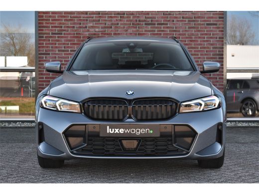BMW 3 Serie Touring 320e M-Sport ACC HUD Sfeer Camera HiFi Stuurverw ActivLease financial lease