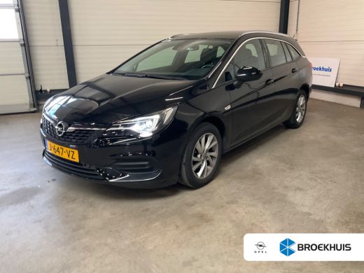 Opel Astra Sports Tourer 1.2 Elegance | Achterbank in delen neerklapbaar | Achteruitrijcamera | Bluetooth te... Opel Astra Sports Tourer 1.2 Elegance | Achterbank in delen neerklapbaar | Achteruitrijcamera | Bluetooth te...