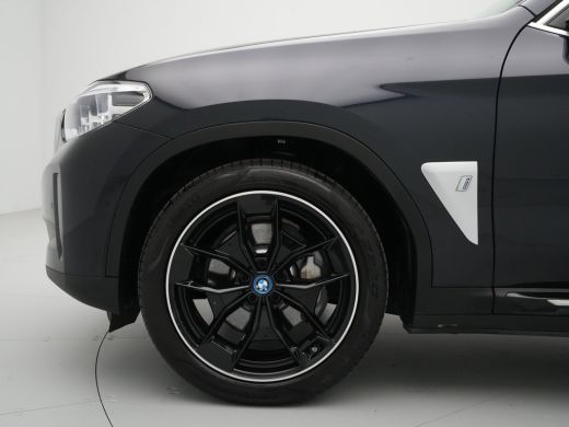 BMW iX3 High Executive 80 kWh 285pk Panorama Navigatie Trekhaak Stoelverwarming 115 ActivLease financial lease